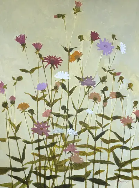 many stems of dahlias in pink, purple, white, and orange on a light green background